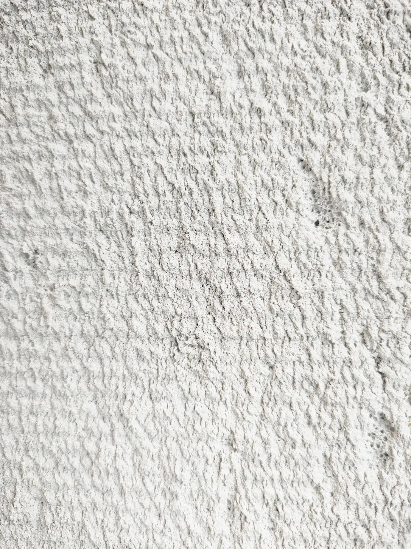 Hintergrund mit Wandtextur aus Ziegeln und Zement